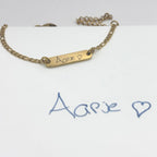 Armband met handgeschreven boodschap